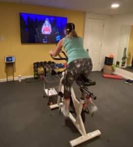 working out at home - spinning to Peloton APP class
